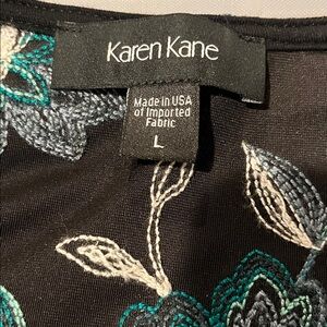 Karen Kane Black Top with Green and Beige Floral Design